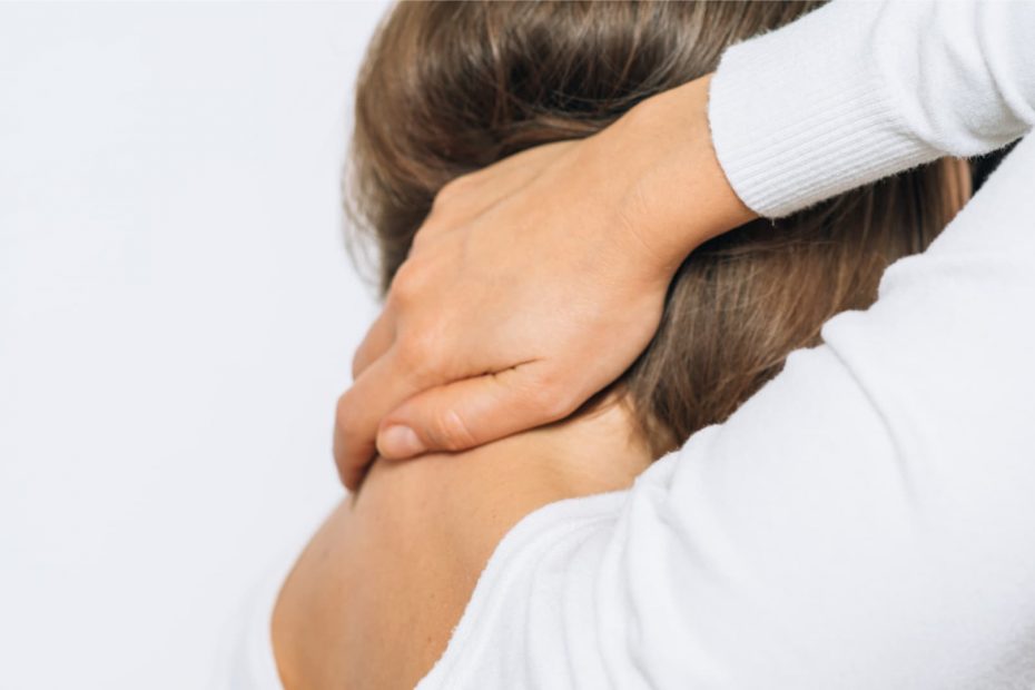 Woman holding neck for headache